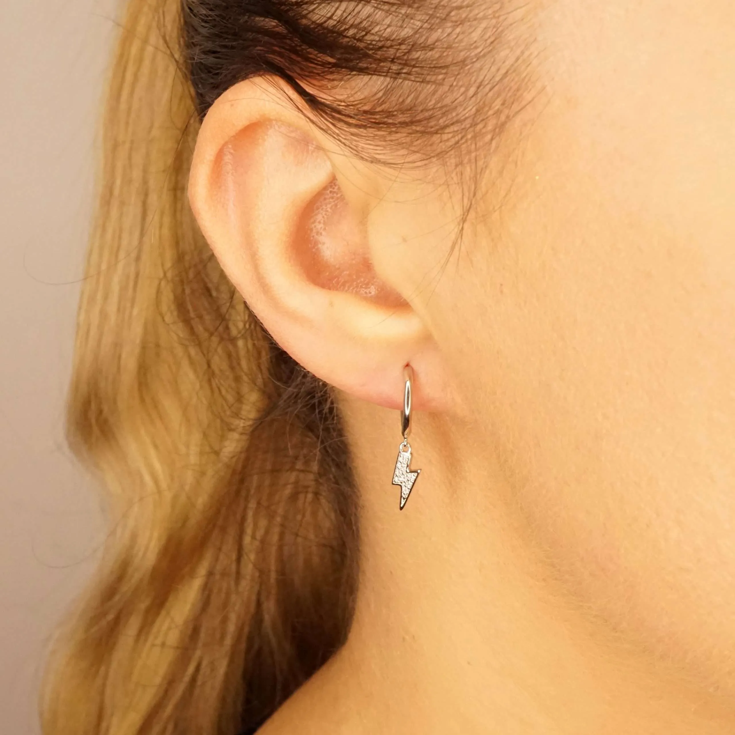 Sparky X - CZ Lightning Bolt Huggie Hoop Earrings