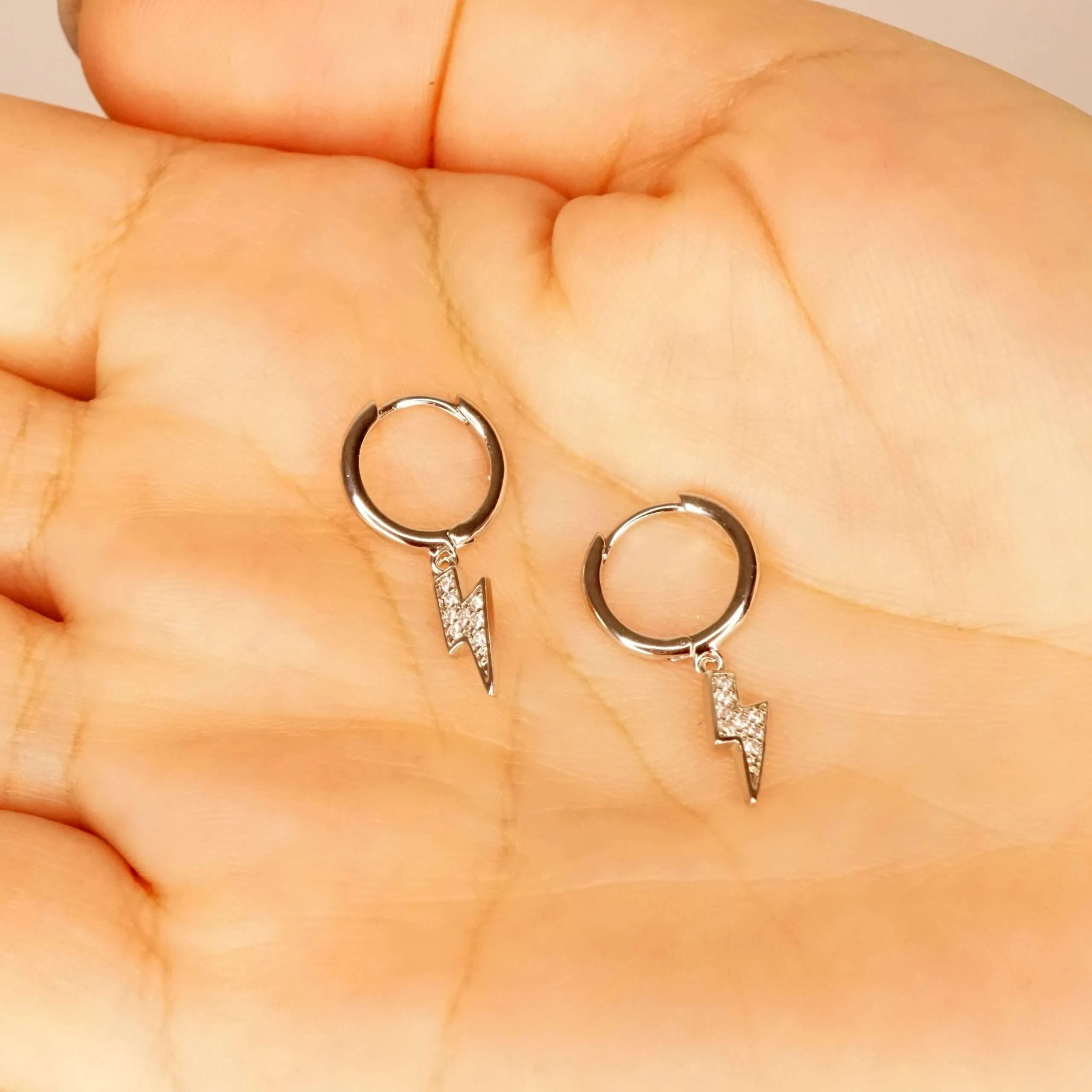 Sparky X - CZ Lightning Bolt Huggie Hoop Earrings